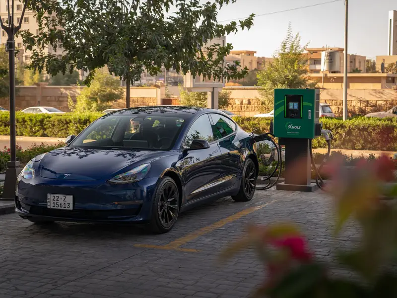 Wall-mounted EV charger installed in a residential car park in Parramatta