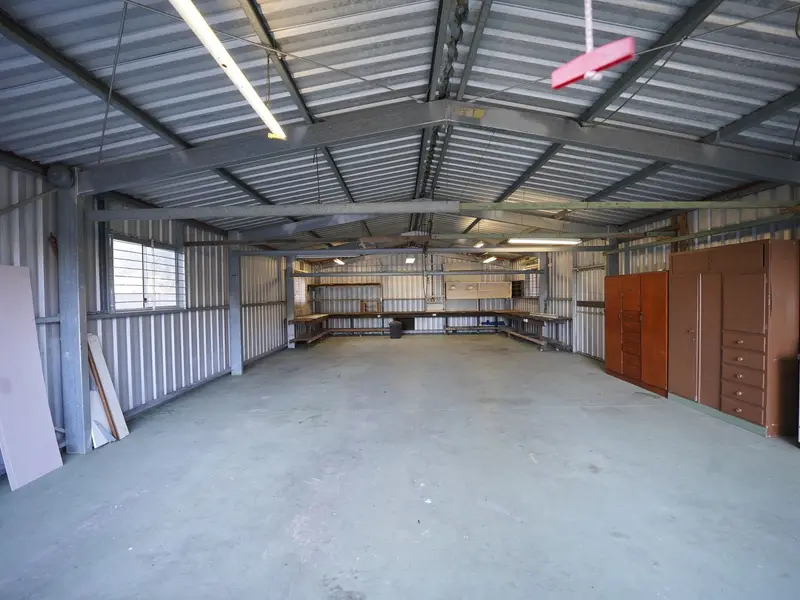 Plastered garage wall before EV charger installation in Chatswood